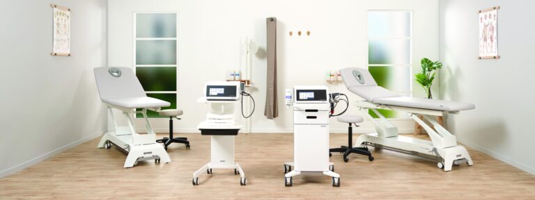 Shockwave therapy machine in private clinic room
